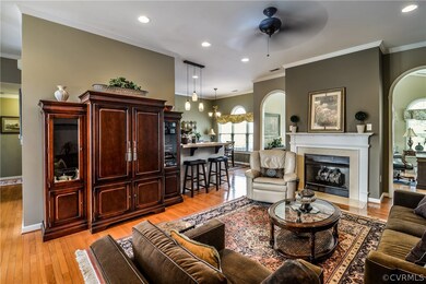 Kitchen overlooks Family Room  with Ceiling Fan an