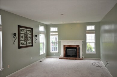 Gas fireplace is the focal point of this living ro