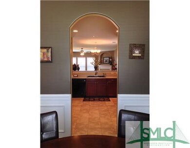 Kitchen. Beautiful arches through out - this one l