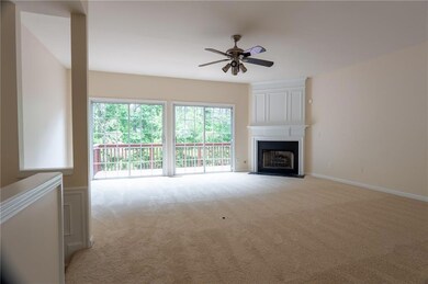 Unfurnished living room with light carpet, ceiling
