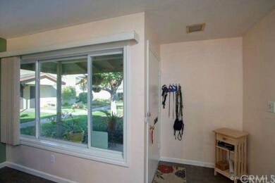 Exterior view from Living Room to the lush green g