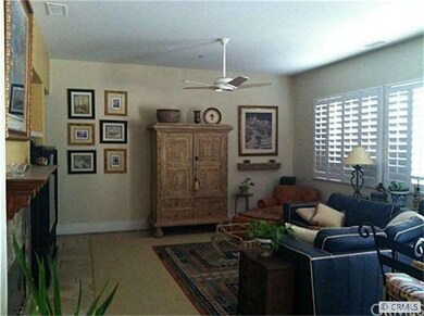 Family room shows the insulated plantation shutter