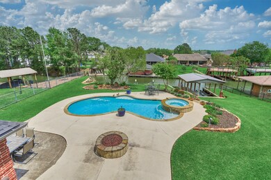 From this vantage we see the pool deck, multiple outdoor dining areas, and the boathouse. The gas fire pit is the perfect place to enjoy the cool evenings with a view of the water!