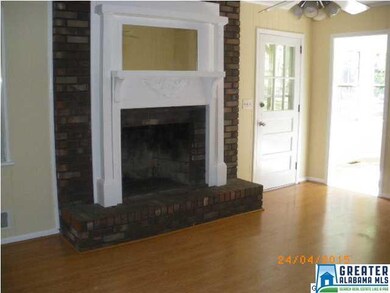 GREATROOM WITH FIREPLACE OFF KITCHEN