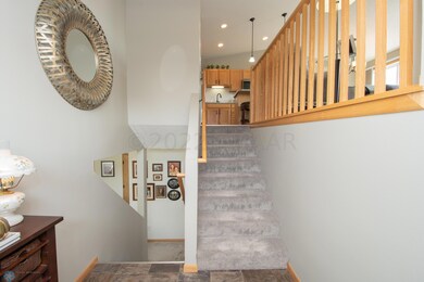 Stairs up & down from foyer