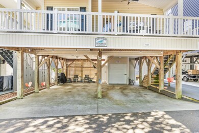 Exterior space with a carport and driveway