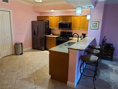 Kitchen with pantry and breakfast bar