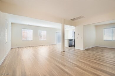 Unfurnished living room with light wood-type floor