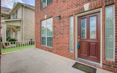 Grand front patio with plenty of seating space!