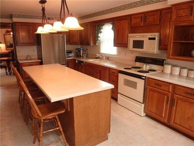 Kitchen. The kitchen provides a large island with 