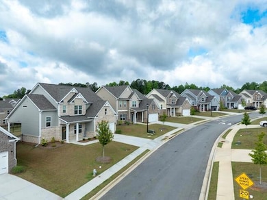 View of street featuring a residential view, curbs, and sidewalks