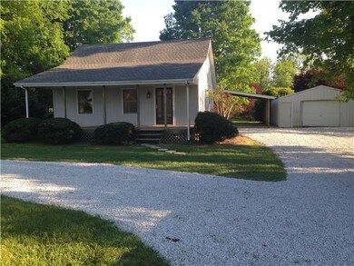 Another front view of the property with a large co
