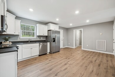 Custom shaker cabinets with stainless appliances