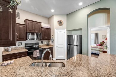 Kitchen with granite counters and lots of counter
