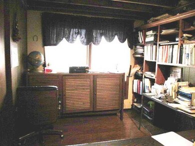 Computer Room. Office, could be used for bedroom, has closets and built in bookcases.