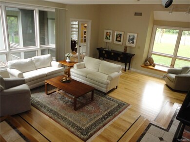 Brand new Ash flooring with inlay.  Living room wi