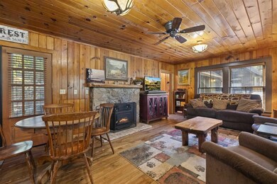 Featuring wood burning stove