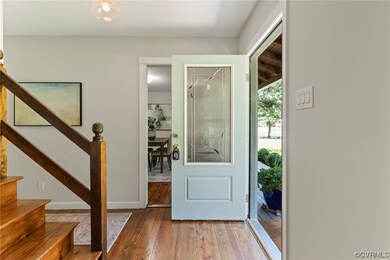 Foyer with hardwood flooring