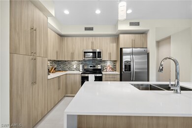 Kitchen featuring appliances with stainless steel