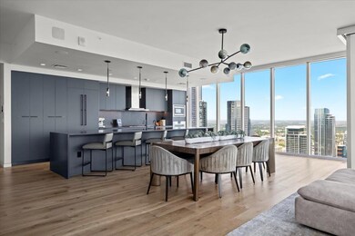 Dining area with floor to ceiling windows, light 