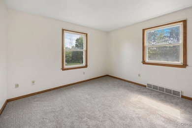 5696 Caughdenoy Rd, Clay, NY 13041 - photo 7