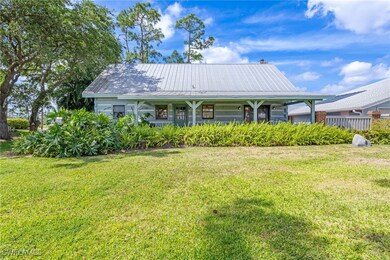 View of front of house featuring metal roof