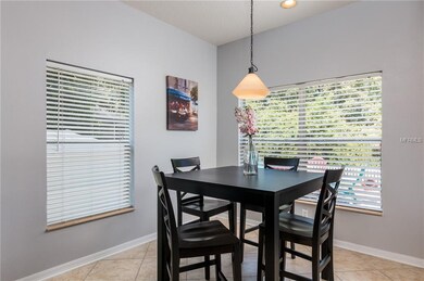 Eating area in kitchen with view to back yard.