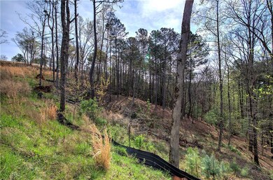 View of landscape featuring a forest view