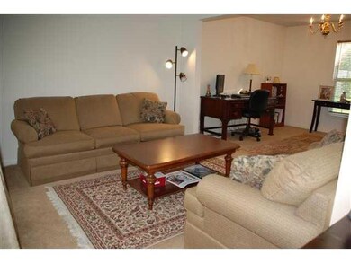 Living Room Formal living room opens to the formal