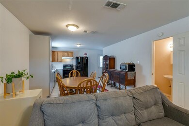 Half bath downstairs for guests.