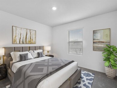 Step into the luxurious first floor primary bedroo