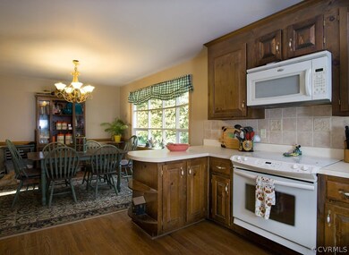Kitchen with updated lighting, picture window and