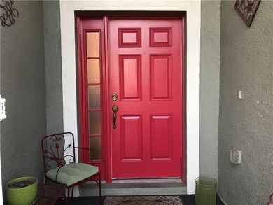 Front Door Outside and in Small Screened Enclosure