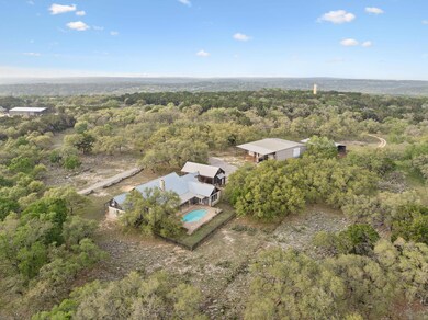 Bird's eye view with a wooded view