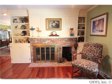 Exterior Front Living room with Brick Faced Firepl