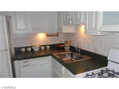 Kitchen - Charming and functional!  Kitchen has been remodeled. New cabinets, counter, under counter lighting, ceramic floor tile