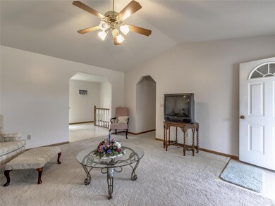 Living has vaulted ceiling, some built in shelves 