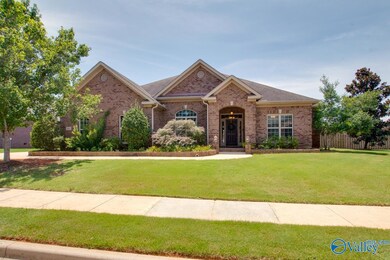 Magnificently maintained landscaping surrounds the home - sprinkler system installed for easy watering!
