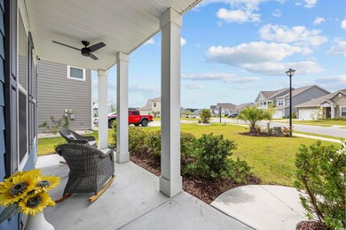 View of patio / terrace featuring a garage, ceilin