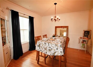 Dining room with built-in China cabinet and gleami