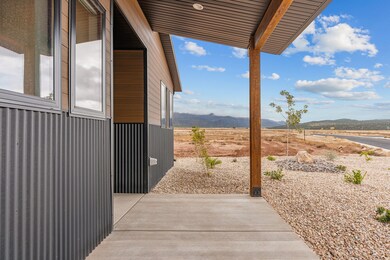 View of patio featuring a mountain view and a view of countryside