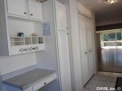 Other Kitchen pantry, desk and main entrance close