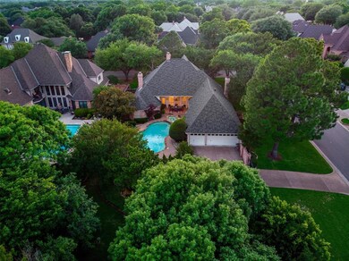 3 car rear garage, gated parking, and a sparkling 