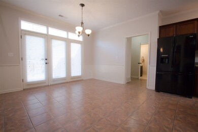 Beautiful Tile flooring-Step Out to Patio.
