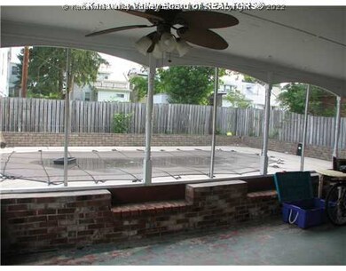 Patio/Deck. screened porch overlooking pool