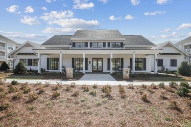 Back of property featuring french doors