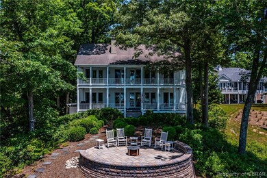 Back of house featuring a patio area, a balcony, a