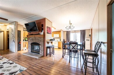 Home features open floor plan and new flooring and doors.