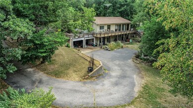 located on 2 acres with lakefront