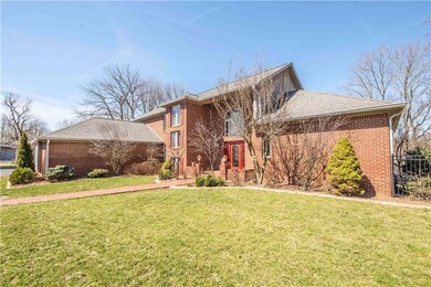 View from your front yard with pretty landscaping just waiting to bloom!